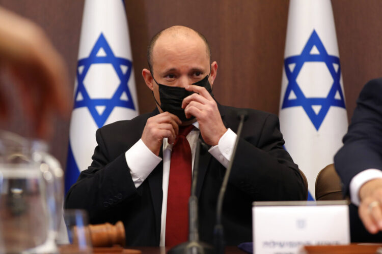 Mon. 8:50 a.m.: Israel to ban travel to US, Canada over omicron variant